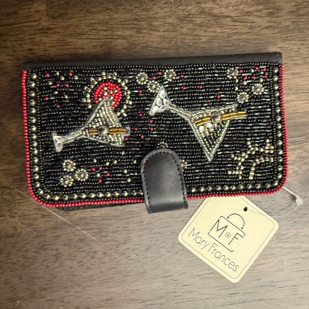 Mary Frances Black Beaded phone case. NWT